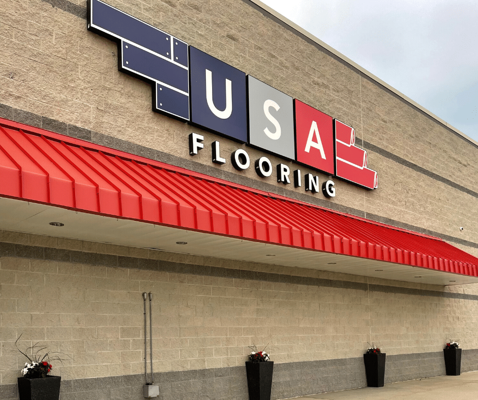 A sign of store USA Flooring Raleigh